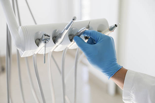 Professional Teeth Cleaning And Checkup technician working in Mineola, NY